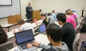 Dr. McIntyre teaches a business class.